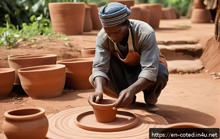 코트디부아르 도자기 및 공예품 기념품 - A skilled Ivory Coast artisan shaping red clay pottery on a traditional wooden wheel outdoors, weari...